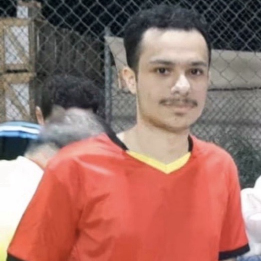 علي العويناتي